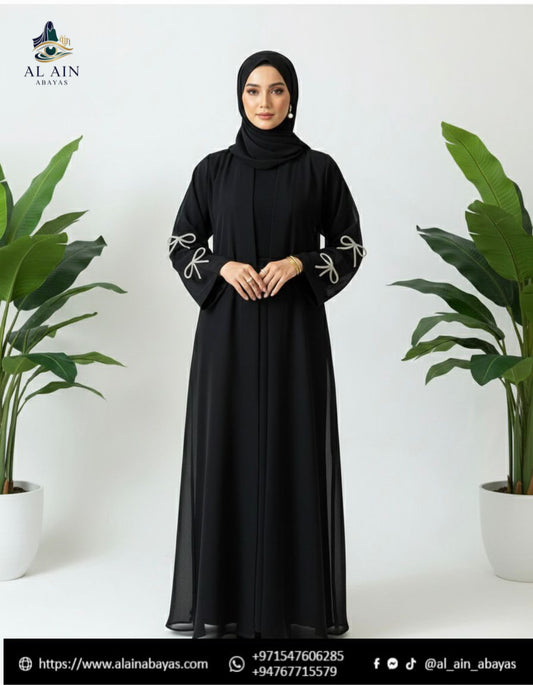 Elegance in the Details: The Pearl Bow Embellished Dubai Abaya